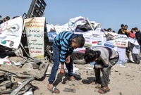 قتلى وجرحى بقصف إسرائيلي على شاحنة مساعدات جنوبي غزة - 3 آذار 2024 (الأناضول)