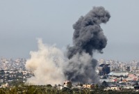 دخان يتصاعد عقب غارات وقصف إسرائيلي على غزة، 27 آذار ـ AFP