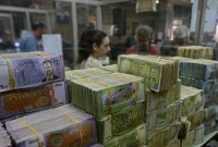 انخفاض تدريجي في قيمة الليرة السورية - AFP