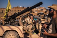 مقاتلون من حزب الله على الحدود بين لبنان وسوريا في عام 2017 - نيويورك تايمز