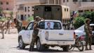 عناصر من قوات النظام السوري في درعا (AFP)