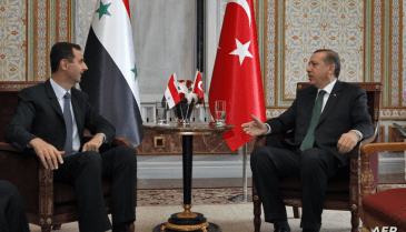 رئيس النظام السوري بشار الأسد والرئيس التركي رجب طيب أردوغان - أ ف ب