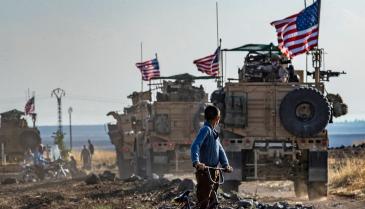 رتل من المدرعات الأميركية بالقرب من مدينة القحطانية شمال شرقي محافظة الحسكة - 31 من تشرين الأول 2019 (AFP)