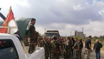 عناصر من قوات النظام السوري في مدينة نوى بريف درعا الشمالي - 3 تشرين الأول 2021 (سبوتنيك)