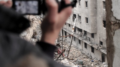 syria_media_activist_filming_dec2012_demotix.jpg