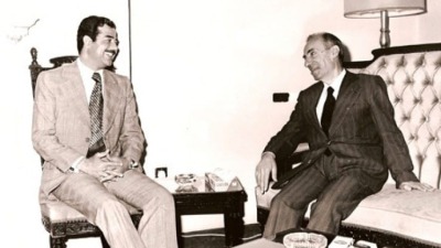 iraqi_president_saddam_hussein_with_baath_party_founder_michel_aflaq_in_1979.jpg