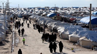 file-photo-women-walk-through-al-hol-displacement-camp-in-hasaka-governorate.jpg
