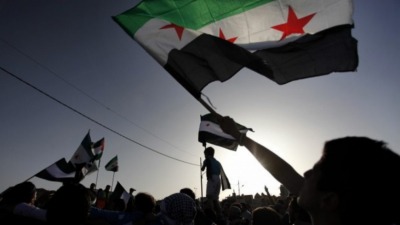 syria-opposition-flags-e1369057621152-1280x720.jpg