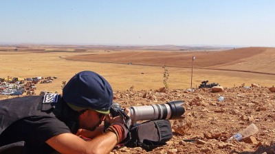 syria-journalist-photographer-camera-attacks-violations-conflict-getty.jpg