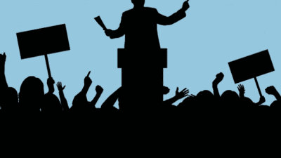 png-clipart-silhouette-of-person-standing-in-front-of-crowd-nigeria-politics-politician-political-party-editorial-politics-microphone-people.png
