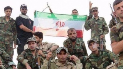 الدولارات الإيرانية وتجنيد أبناء الجنوب السوري.. ما موقف النظام وروسيا؟