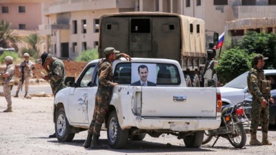 عناصر للنظام في درعا (AFP)