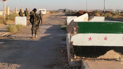 عناصر من قوات النظام السوري في محافظة درعا - رويترز