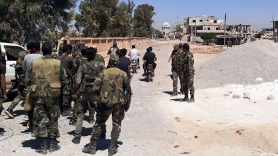 عناصر من قوات النظام السوري في ريف درعا - AFP