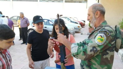 تدريب أطفال على استعمال السلاح في سوريا