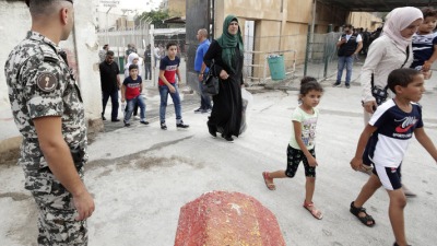 اللاجئون السوريون في لبنان (AFP)