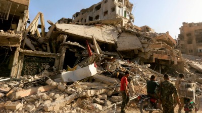 منازل مدمرة في مخيم اليرموك جنوبي دمشق - أ ف ب