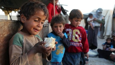 أطفال سوريون في أحد المخيمات