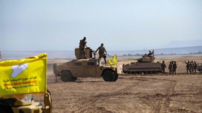 جنود أميركيون وعناصر من "قسد" شمال شرقي سوريا - AFP