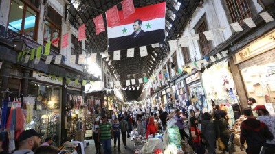 سوق الحميدية في العاصمة دمشق (رويترز)
