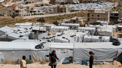 مخيم للاجئين السوريين في بلدة عرسال الحدودية شرقي لبنان - أسوشييتد برس