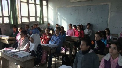 صف دراسي بأحد المدارس في مناطق النظام في سوريا (سبوتنيك)