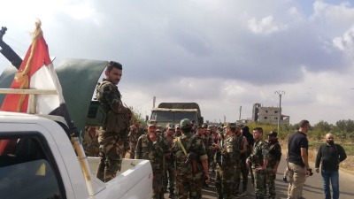 عناصر من قوات النظام السوري في مدينة نوى بريف درعا الشمالي - 3 تشرين الأول 2021 (سبوتنيك)