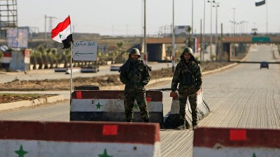 حاجز لجيش النظام السوري في دمشق (رويترز)