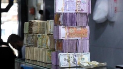 سعر الليرة السورية مقابل الدولار (الأناضول)