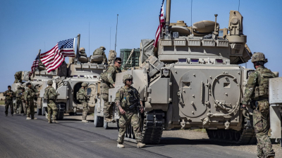 دورية للقوات الأميركية قرب يلدة رميلان بريف الحسكة في شمال شرقي سوريا - AFP