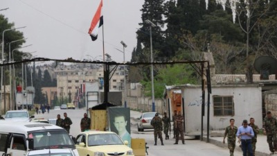 حاجز لقوات النظام السوري على مدخل حي الشيخ مقصود شمالي حلب - "وكالة هاوار للأنباء"