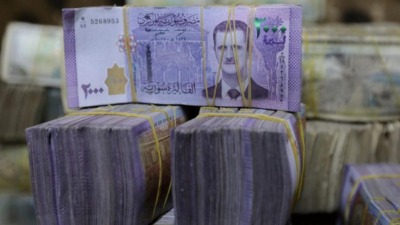 مصارف النظام السوري تستمر بعرقلة استلام الموظفين لقرض لا تتجاوز قيمته 60 دولاراً