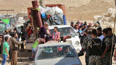 عائلات سورية لاجئة تغادر لبنان نحو سوريا - AFP