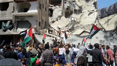 احتفالية في مخيم اليرموك بدمشق خلال الذكرى 74 لنكبة الشعب الفلسطيني (AP)