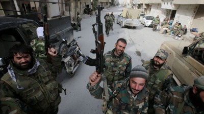 عناصر من قوات النظام السوري وميليشياته - AFP