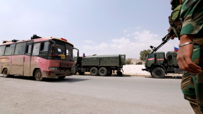 قوات للنظام وروسيا قرب دوما بريف بريف دمشق ـ رويترز