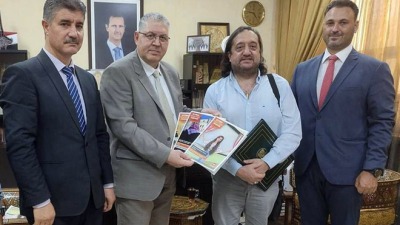 وزير التربية في حكومة النظام السوري مع المدير القطري للمجلس أندريس غونزاليس رودريغير (سانا)