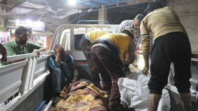 فرق الدفاع المدني تساعد في نقل الضحايا - 26 تموز 2023 (الدفاع المدني السوري)