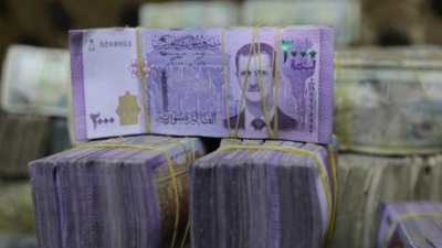 الليرة السورية تسجل أدنى مستوى لها على الإطلاق أمام الدولار