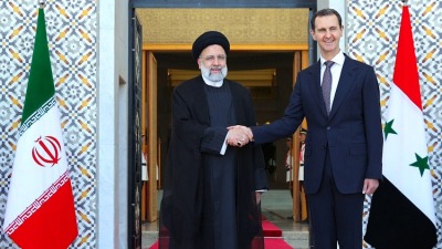 بشار الأسد وإبراهيم رئيسي