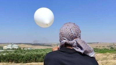 لأول مرة منذ عامين.. عودة إطلاق بالونات حارقة من قطاع غزة يتسبب بحريق في مستوطنة
