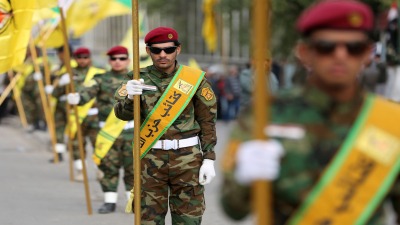 عرض عسكري لميليشيا "حزب الله" العراقية - Getty