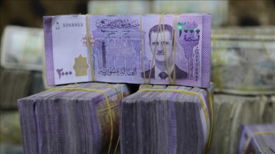 النظام وإيران يبحثان استخدام العملات المحلية للتبادل التجاري