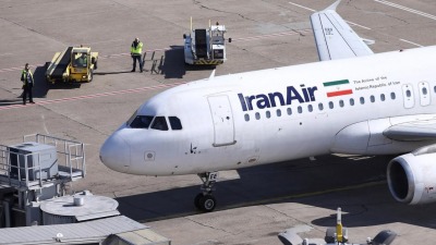طائرة ركاب تابعة لشركة "إيران إير" متوقفة في مطار نيكولا تسلا في صربيا، 13 آذار 2018. – (رويترز)