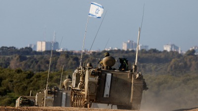 آليات عسكرية إسرائيلية تجري مناورات بالقرب من قطاع غزة – 25 كانون الثاني 2024 (رويترز)