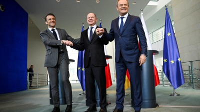 Polish PM Tusk and France's President Macron meet with German Chancellor Scholz in Berlin