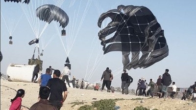 Airdrop of aid into Gaza (AFP)