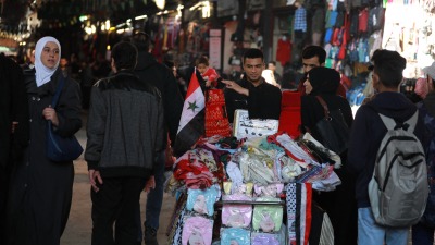 سوق ملابس في دمشق - AFP