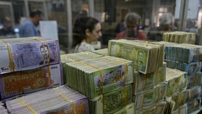 انخفاض تدريجي في قيمة الليرة السورية - AFP